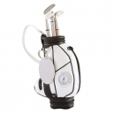 Reloj y porta plumas con temática de golf.